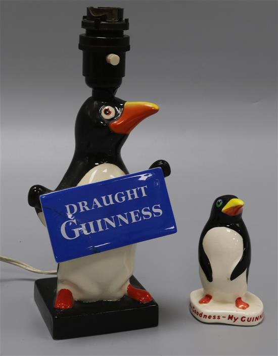 A Carlton ware Guinness advertising penguin lamp base and a similar figure lamp height 24cm